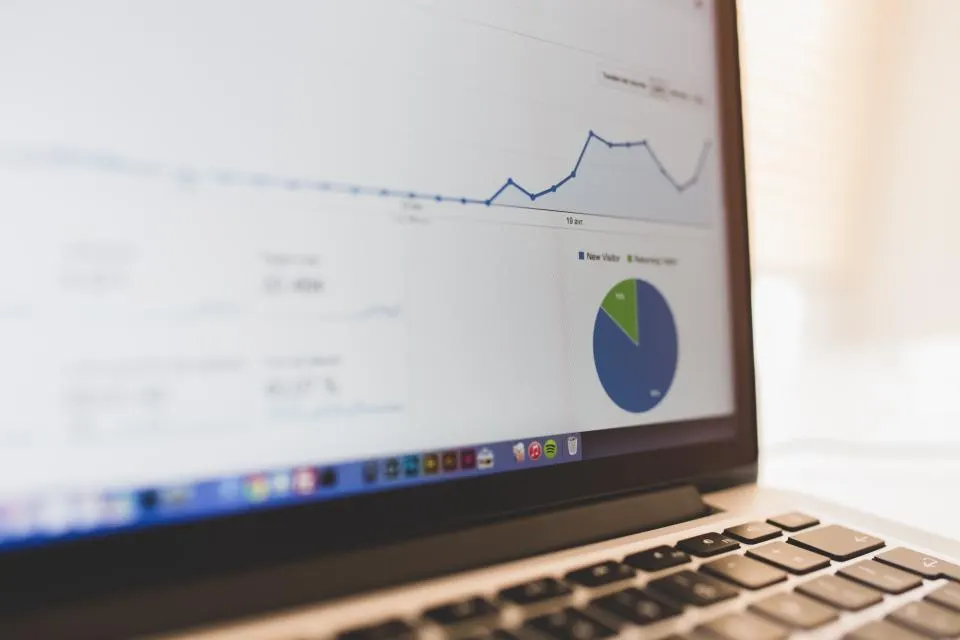 An analytics dashboard displayed on a laptop